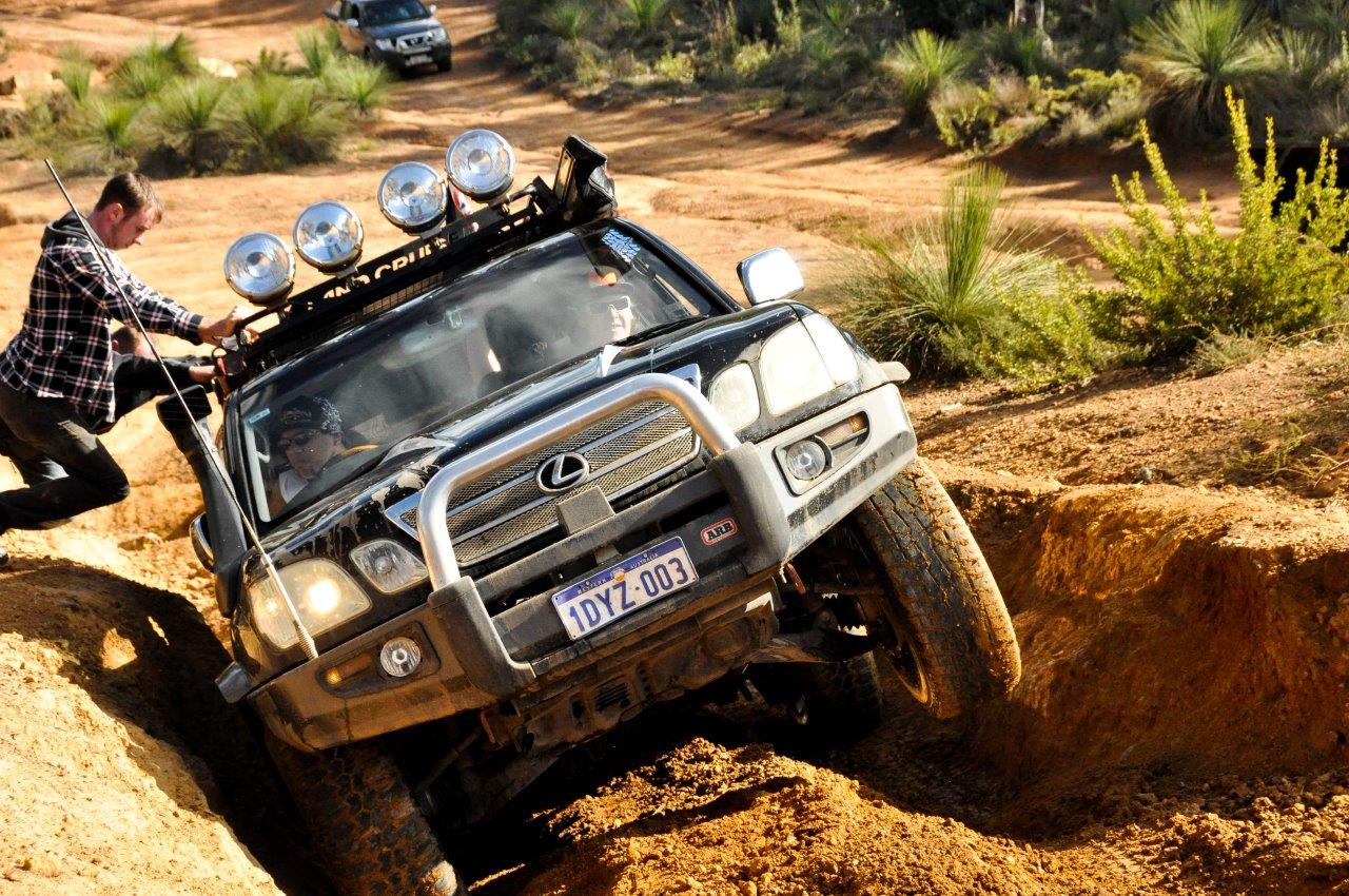 The Lexus Lifting a Wheel