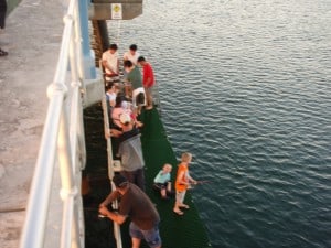 Fishing off Palm Beach Jetty A few people fishing downstairs