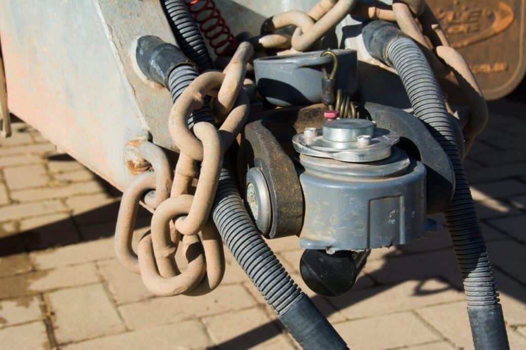 Should you cross your trailer chains, and why?