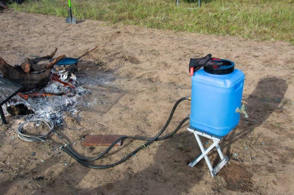 DIY hot water for camping or off grid using a fire
