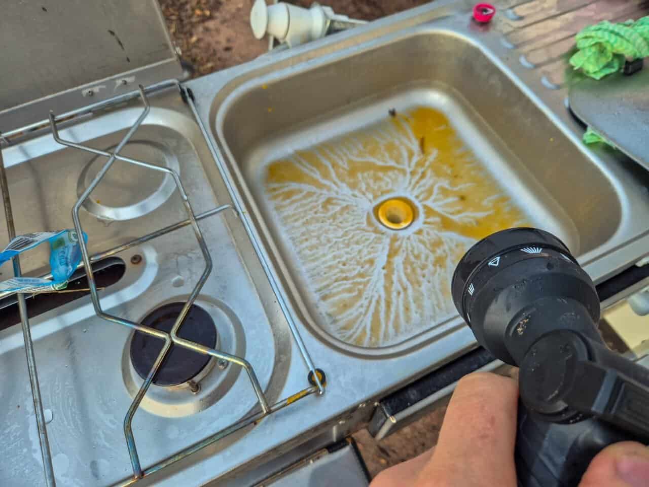 Cleaning our sink of the camper with the Ontap Roam